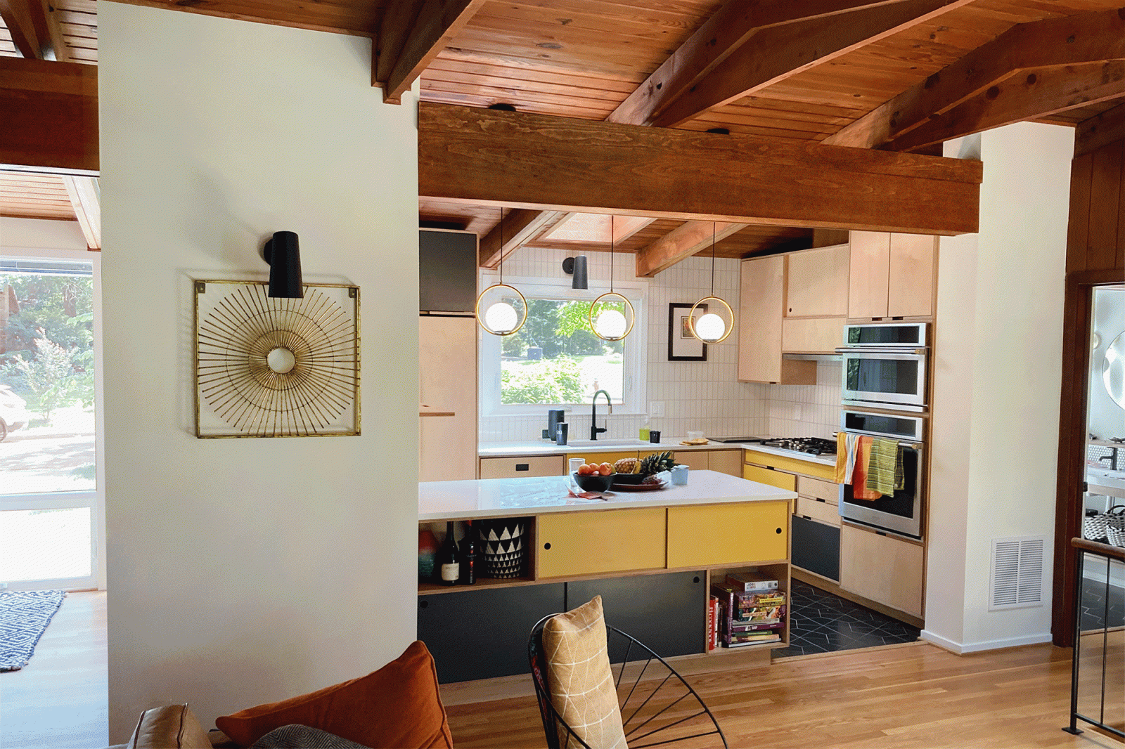 Contrary to popular belief an open kitchen requires much more careful planning to present a well composed image to adjacent spaces