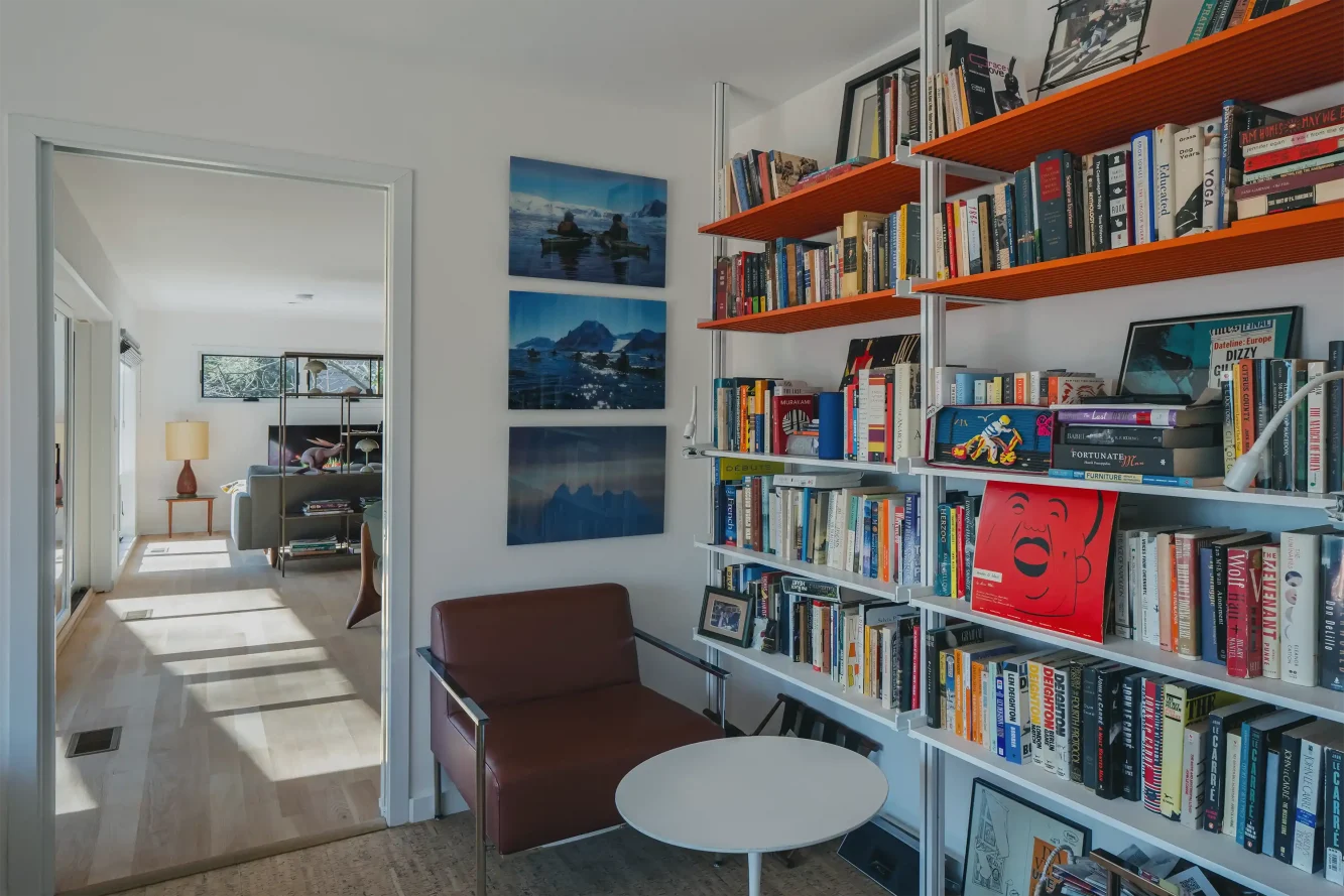 Avid readers, our clients are happiest when lounging in their cantilevered "treehouse" library surrounded by their books and trip photos